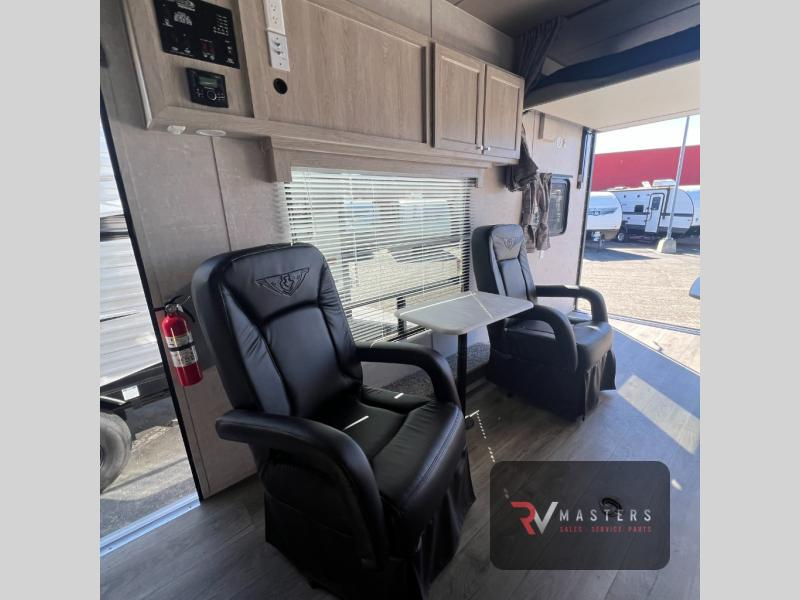 Recliners in the Eclipse Stellar Limited toy hauler travel trailer